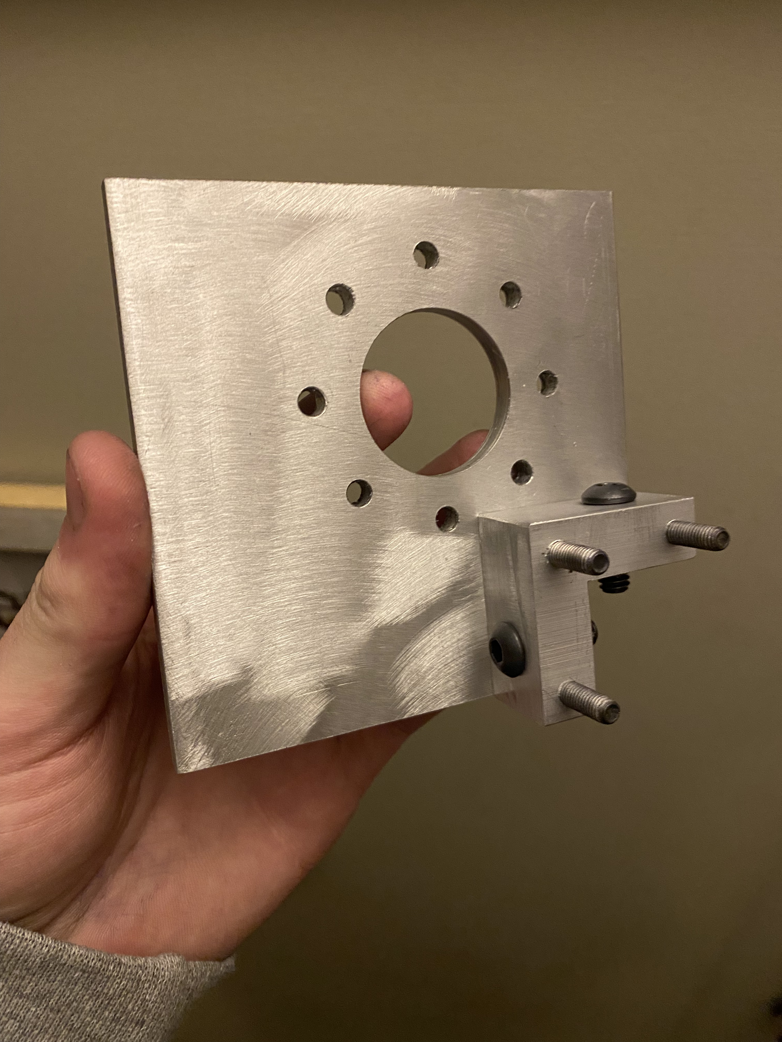 Manually milled bracket for OUTATIDE