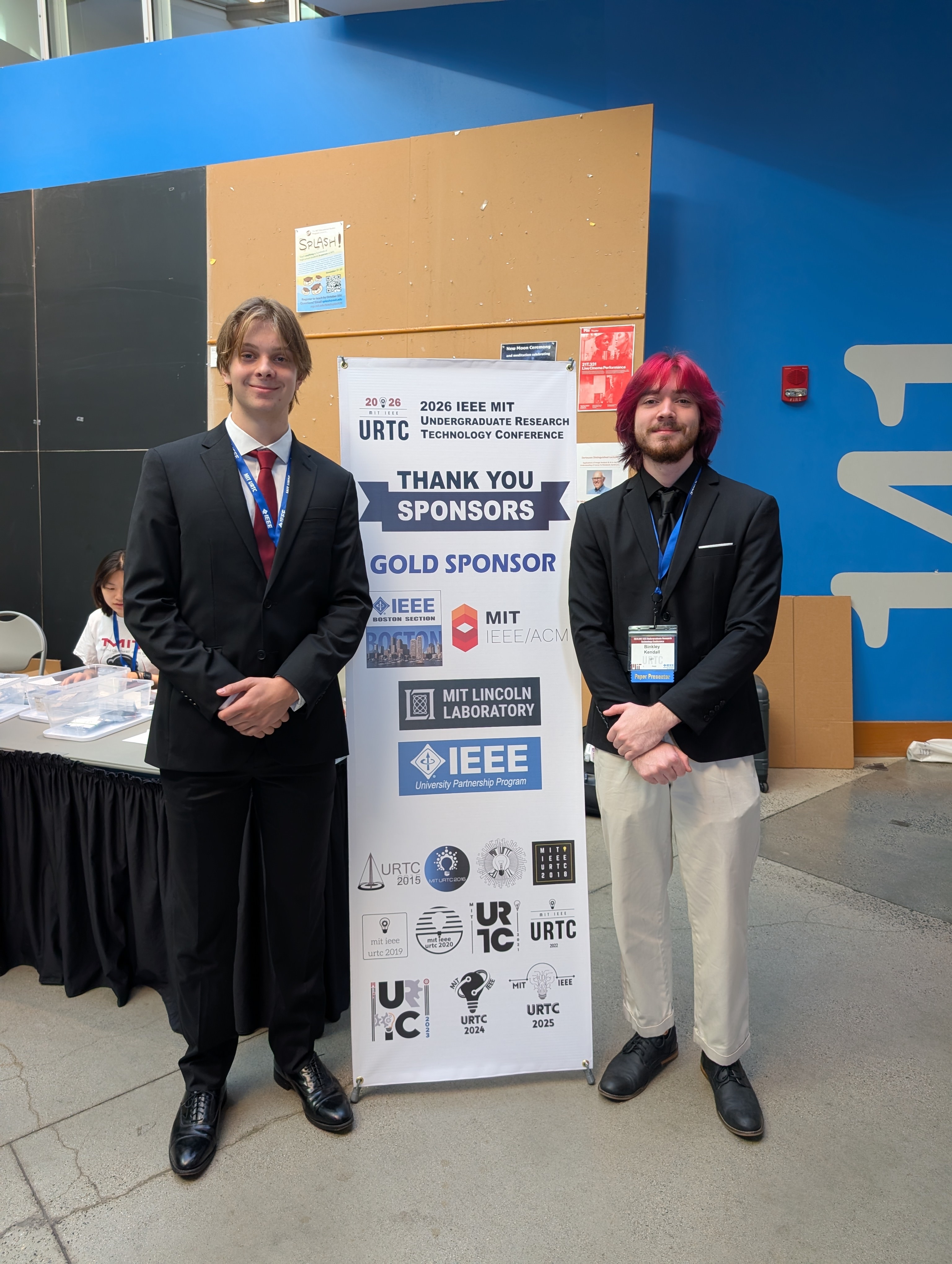 Kendall presenting the research at the 2026 IEEE MIT URTC