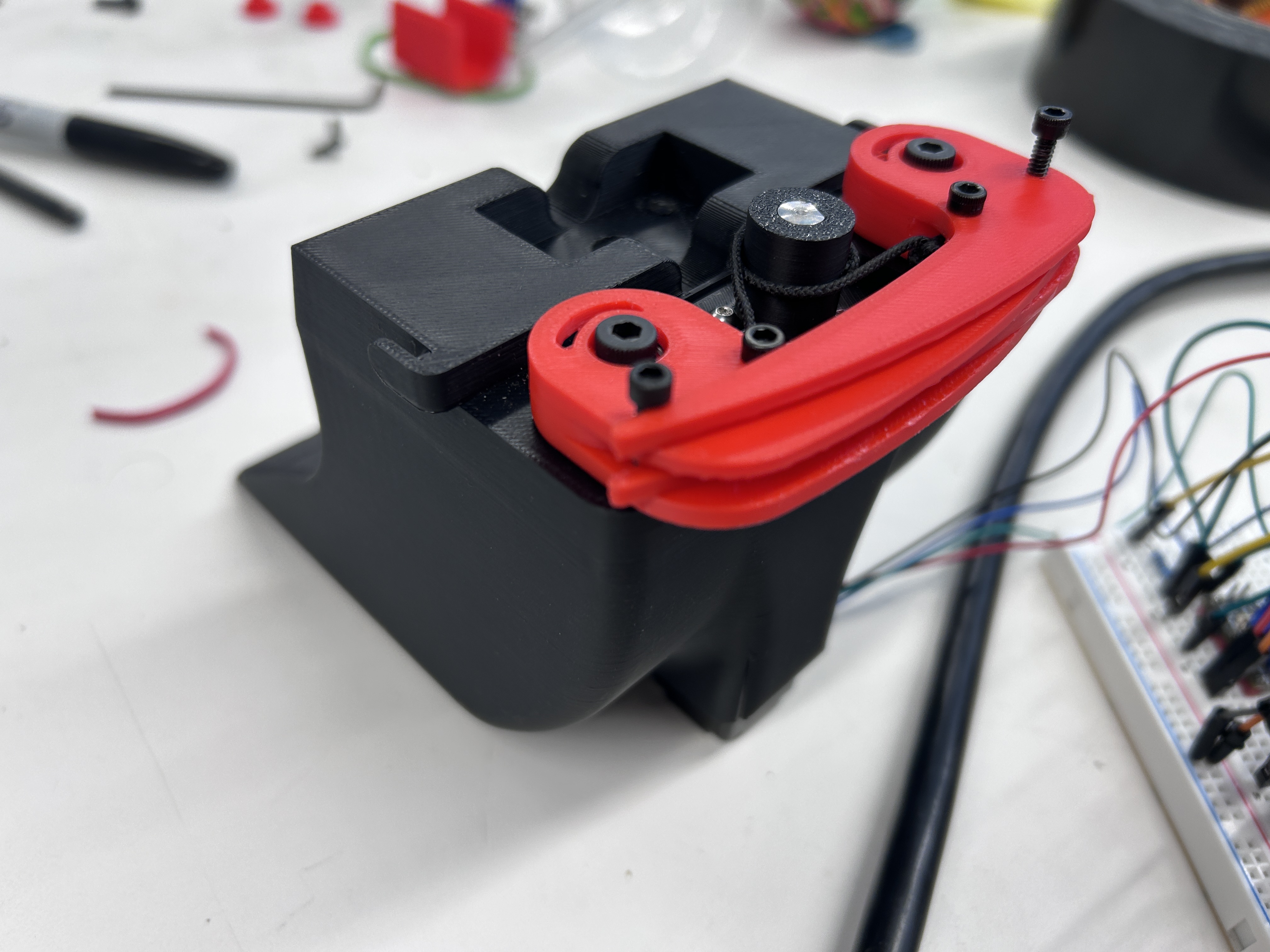 Earlier tilt-rotator grapple design